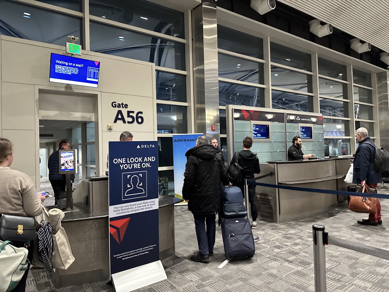 The flight boarded using facial recognition technology, the gate agent did not need to scan my boarding pass