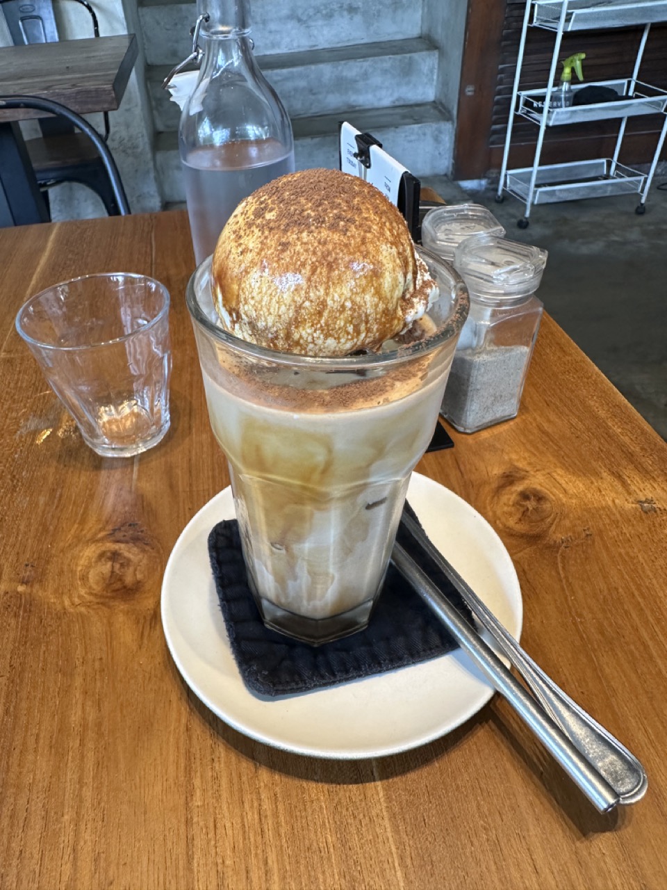 Suka's iced coffee, featuring a scoop of vanilla ice cream on top