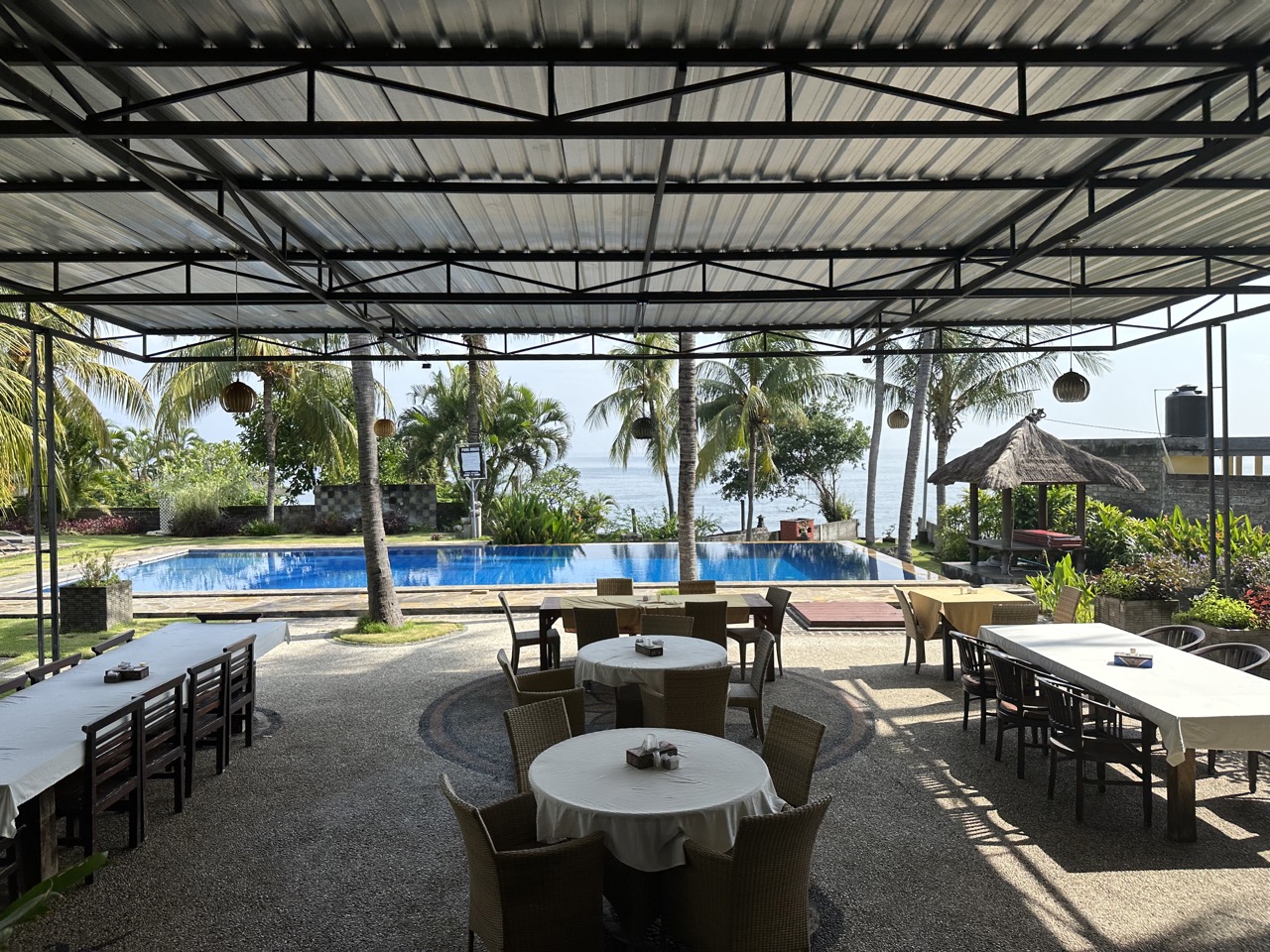 The dining area and pool at the dive resort