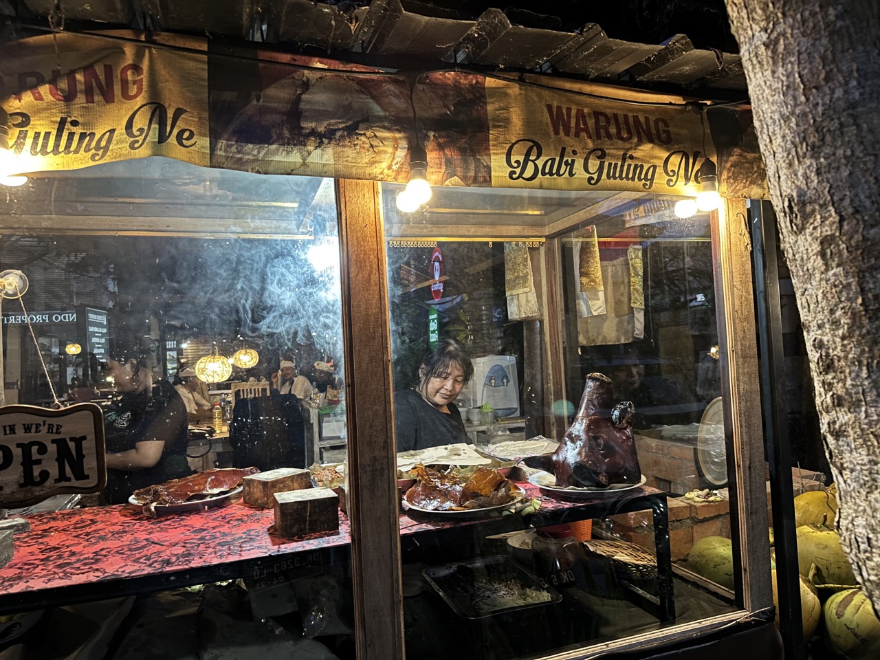 The babi gulung restaurant has the pig head on display outside to attract customers