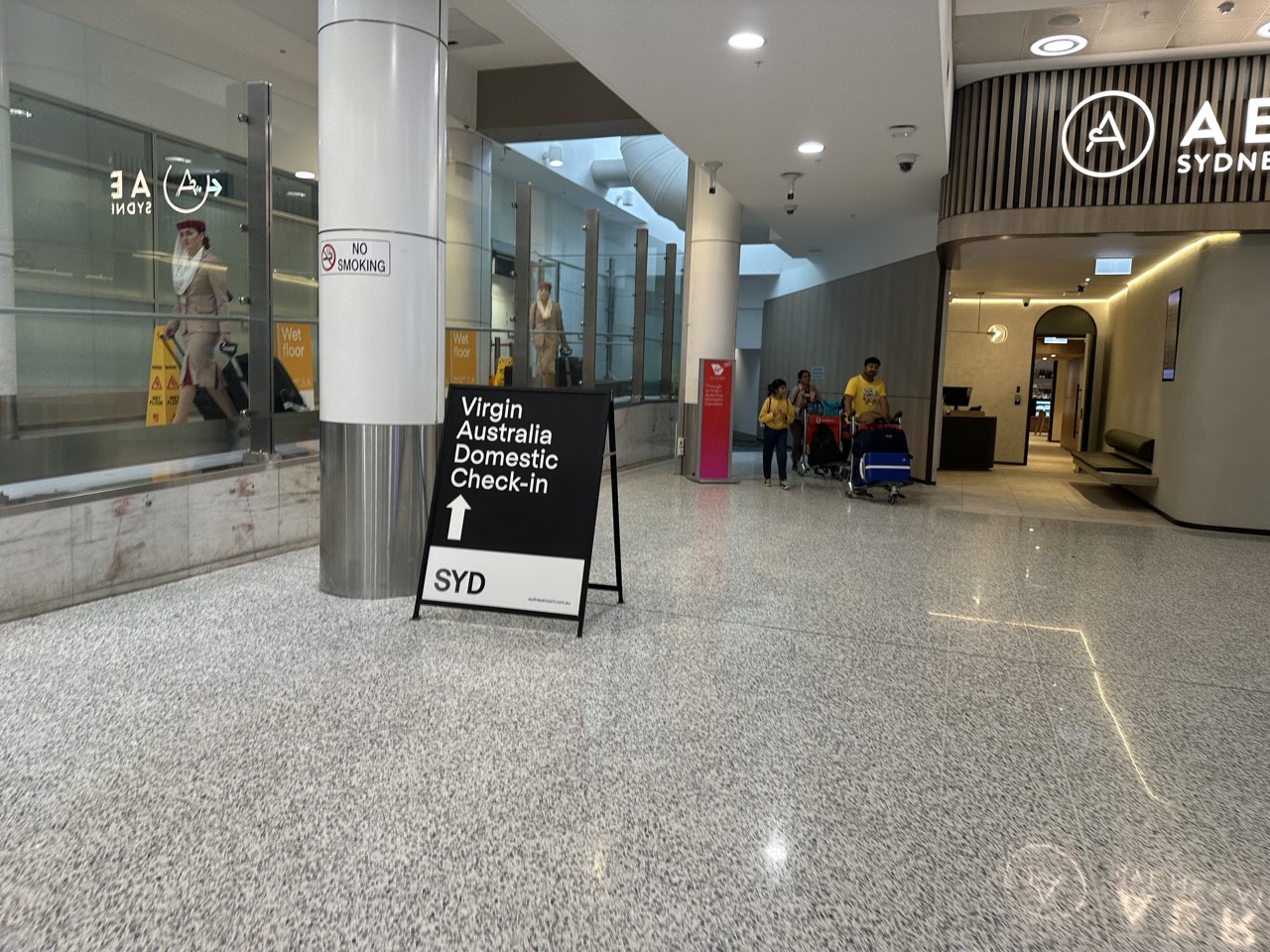 There is a separate area for passengers to check in if they are connecting from an international to a domestic flight on Virgin Australia at Sydney