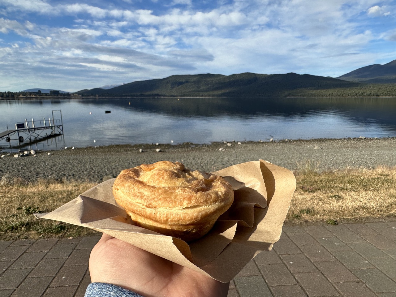 For breakfast I had a venison and plum pie while enjoying the view in front of Lake Te Anau