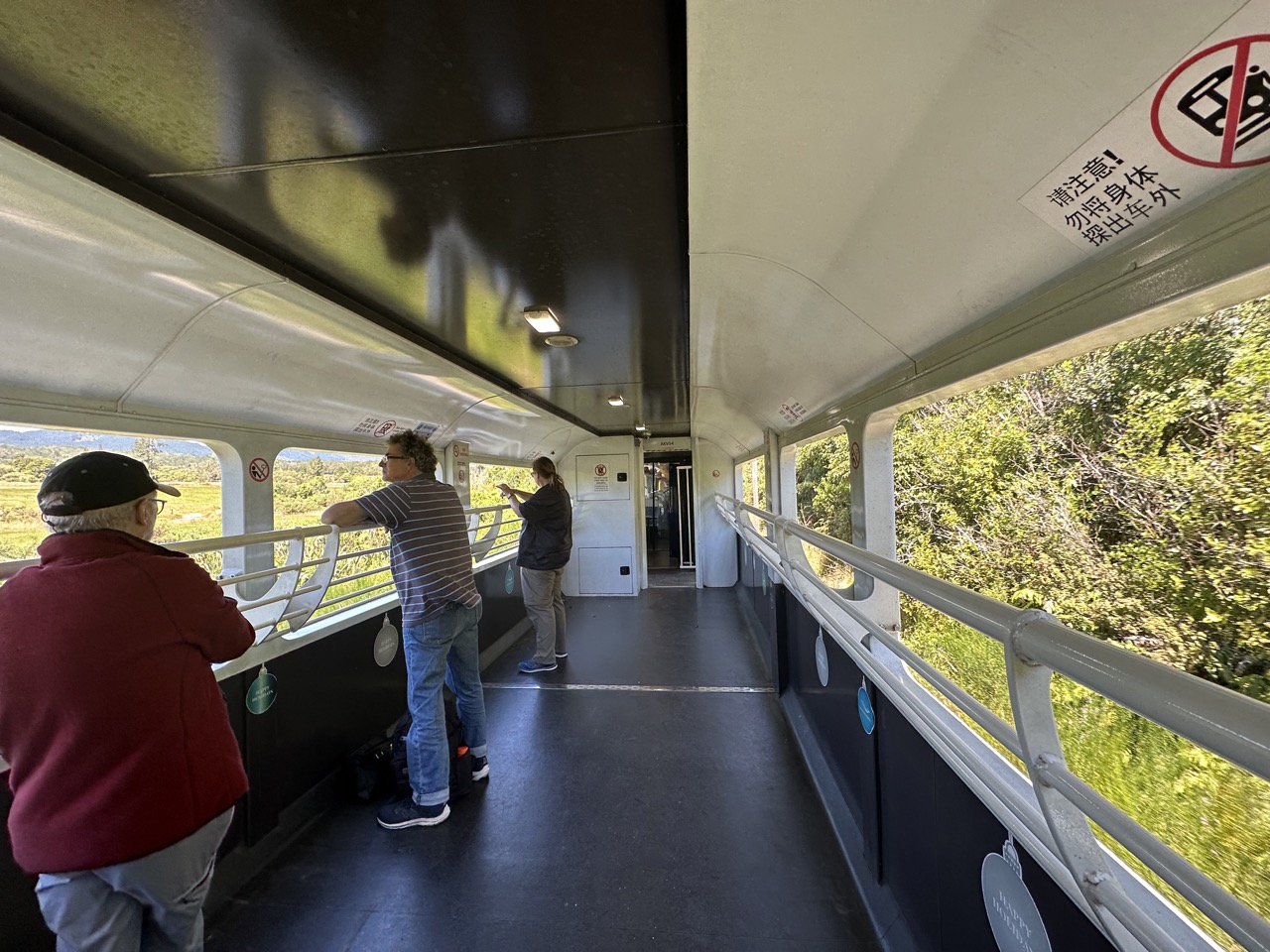 Outdoor viewing car at the rear of the train