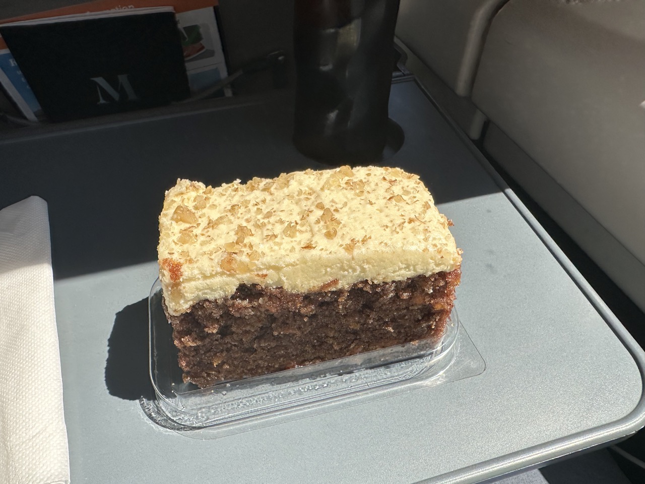 A piece of carrot cake as a snack on board the train