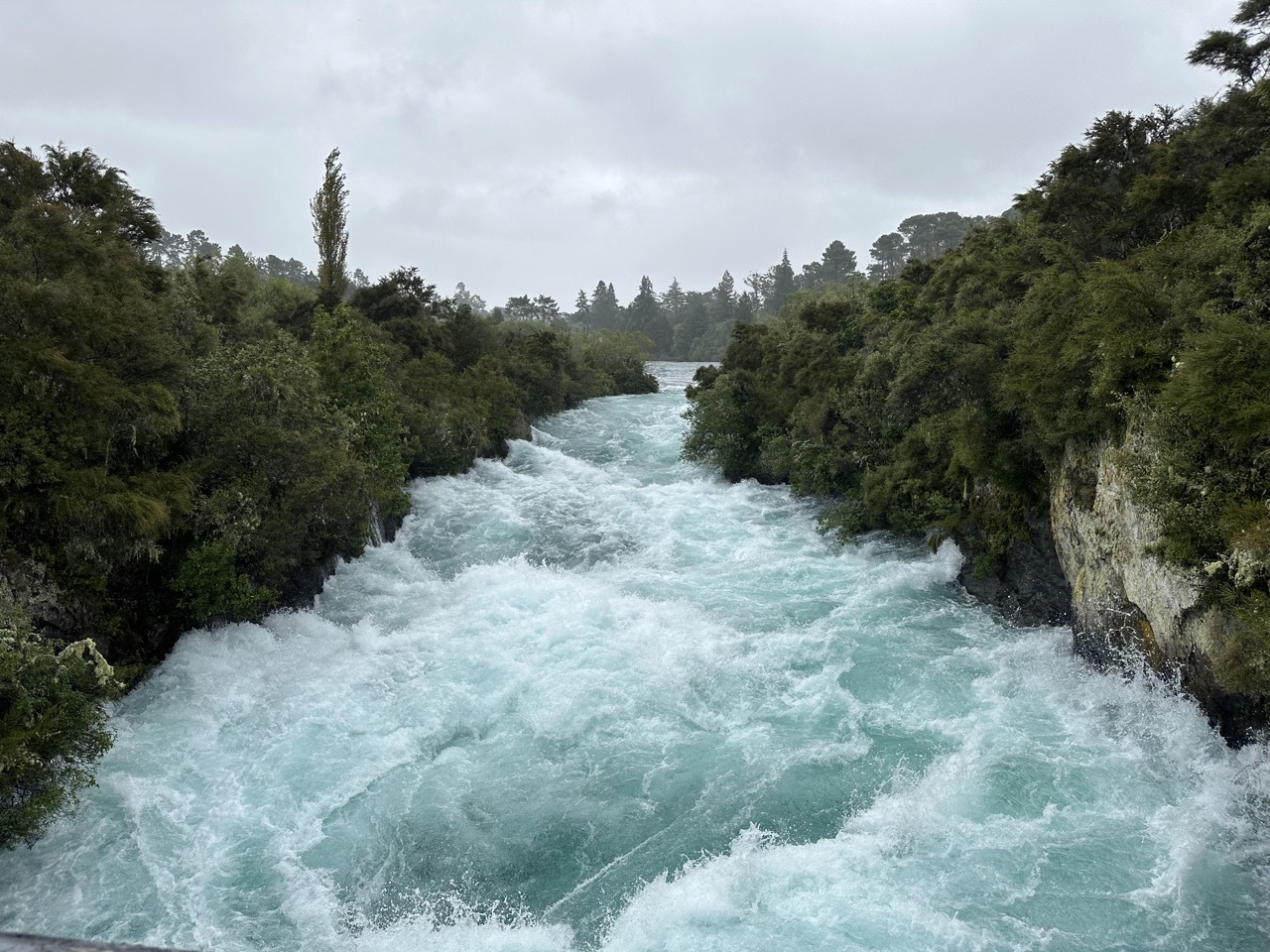 View of Huka Falls from a bridge over the waterfall