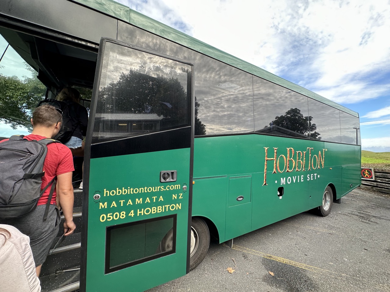 Visitors take buses from The Shire's Rest to the Hobbiton Set