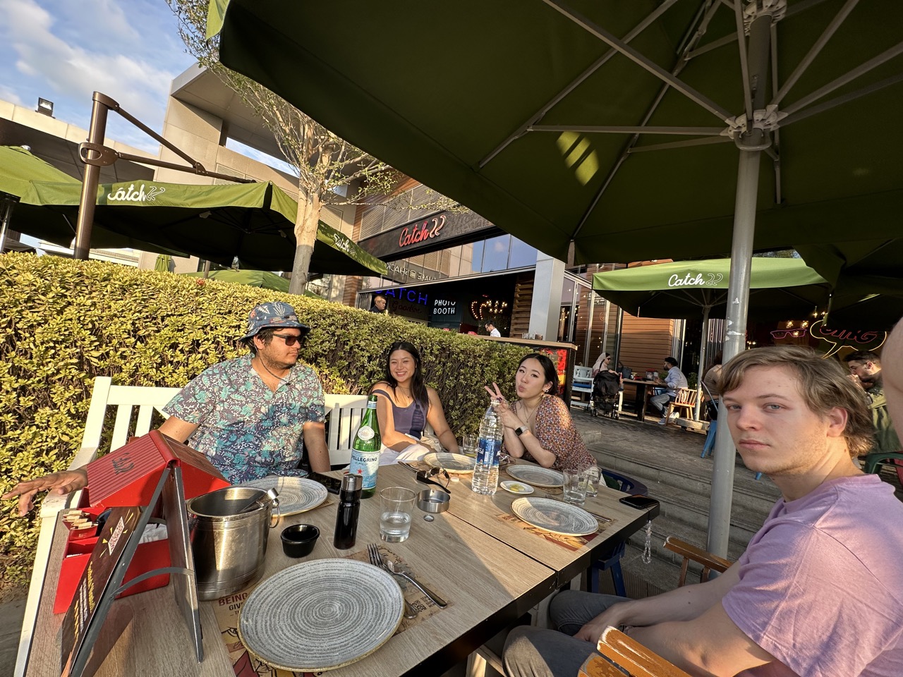 Sitting down to eat at Catch22. My hat matched Murt's shirt perfectly.