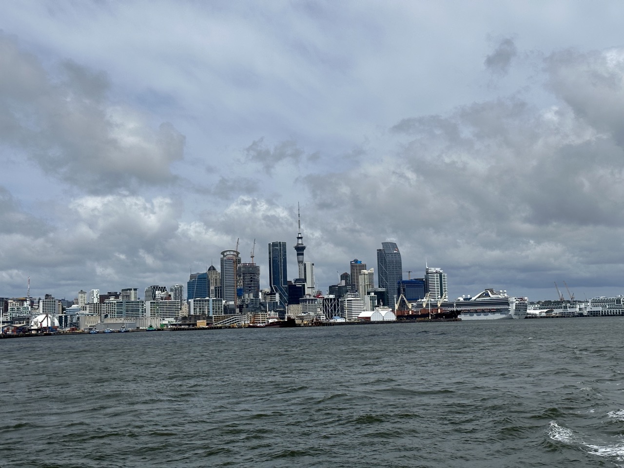 View of Auckland CBD while sailing towards Devonport