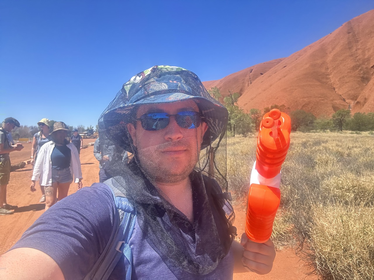 I was given a water gun to cary on the hike, and I wore a fly net to keep flies away from my face