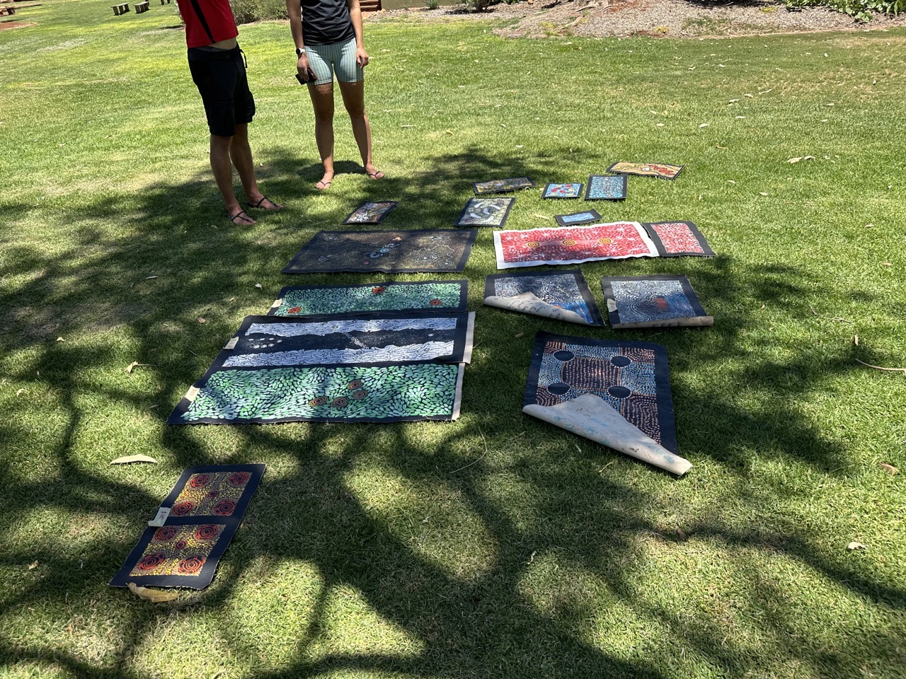 There were some aboriginal women selling artwork on the grass near the shopping center