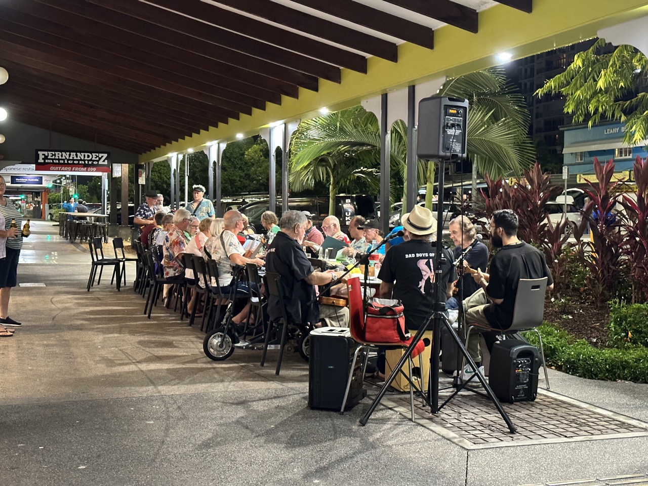 There was a ukulele jam session on the street outside a music store