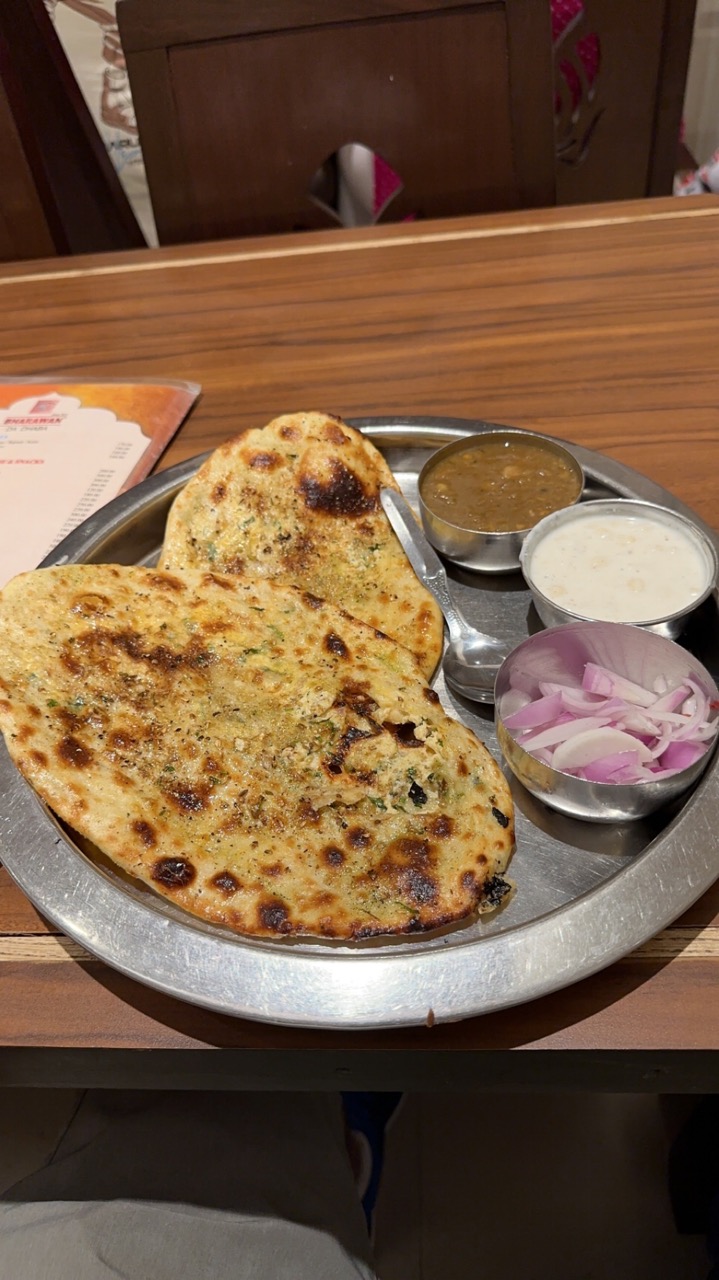 I went to Bharawan Da Dhaba which is famous for their kulcha, I had a cheese stuffed kulcha thali