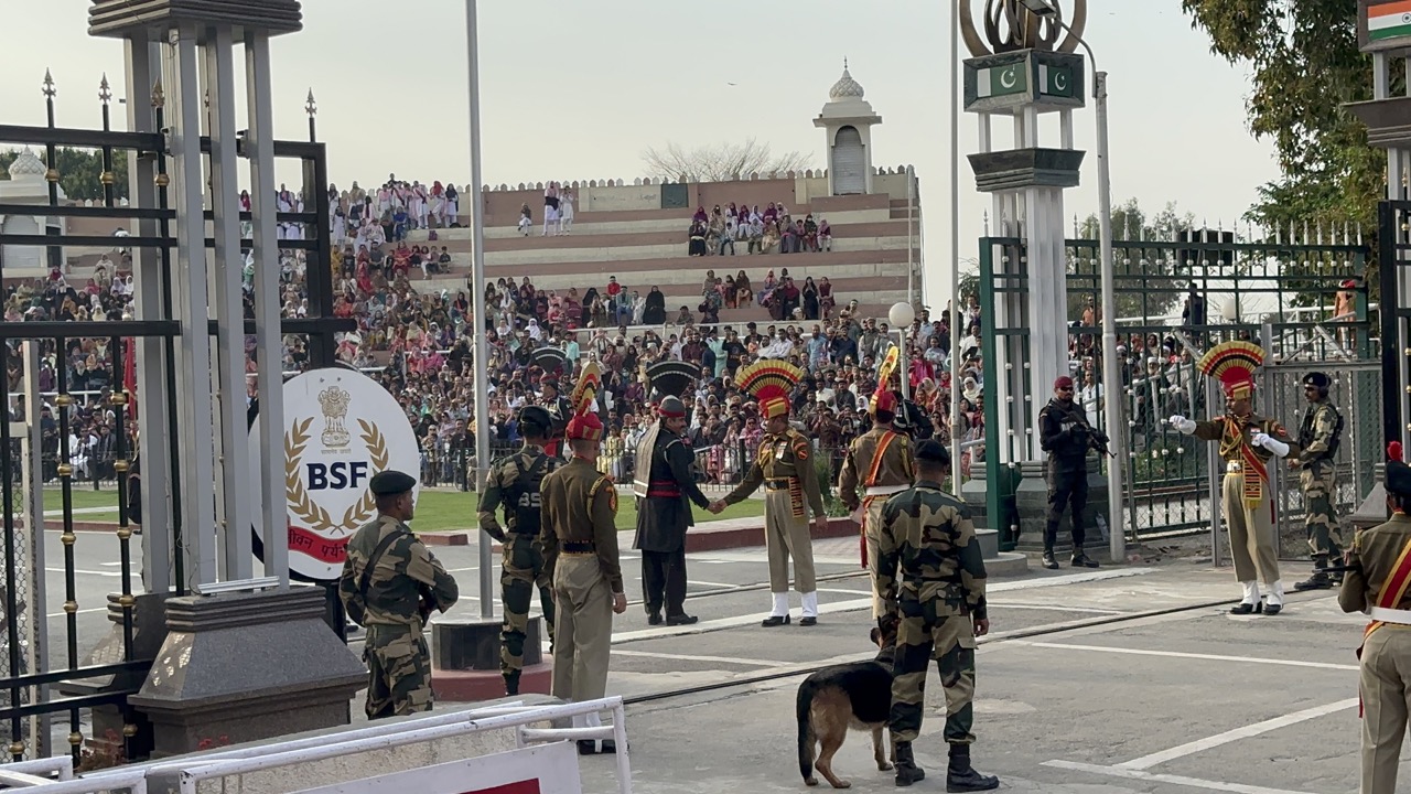 The Indian and Pakistani guards shook hands before lowering the flags and closing the gate