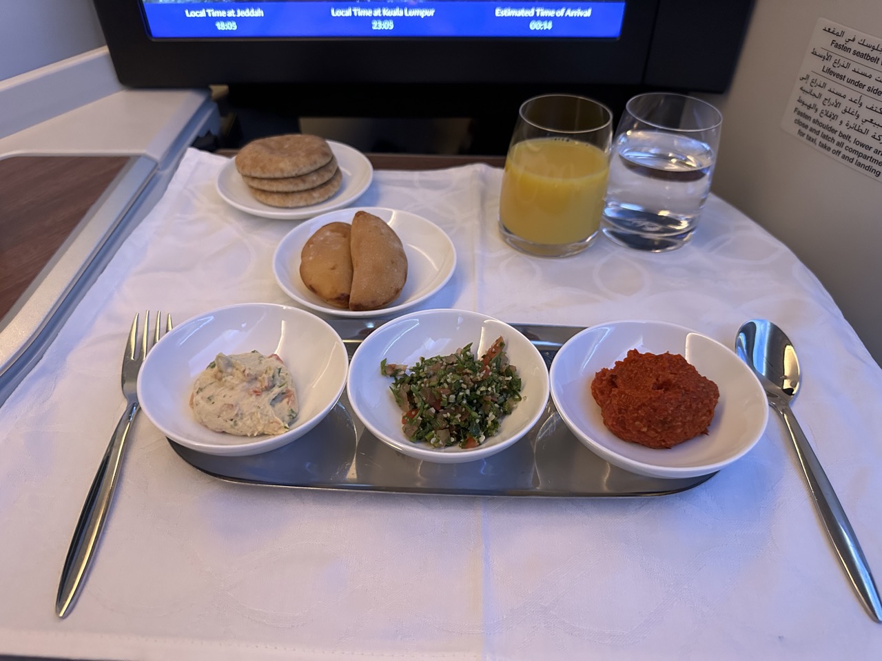 About an hour before departure we were served a light snack. I had this delicious Arabic mezze